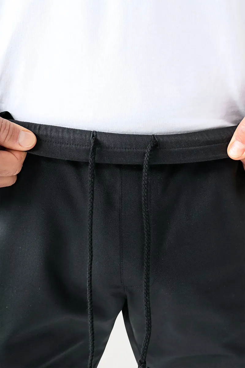 CLINIC STRETCH Hose Herren - Saumbündchen schwarz/gelb