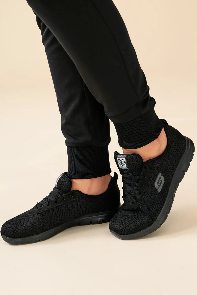 KAERE Hose Damen - Saumbündchen Kurzgr. mit Beintaschen schwarz