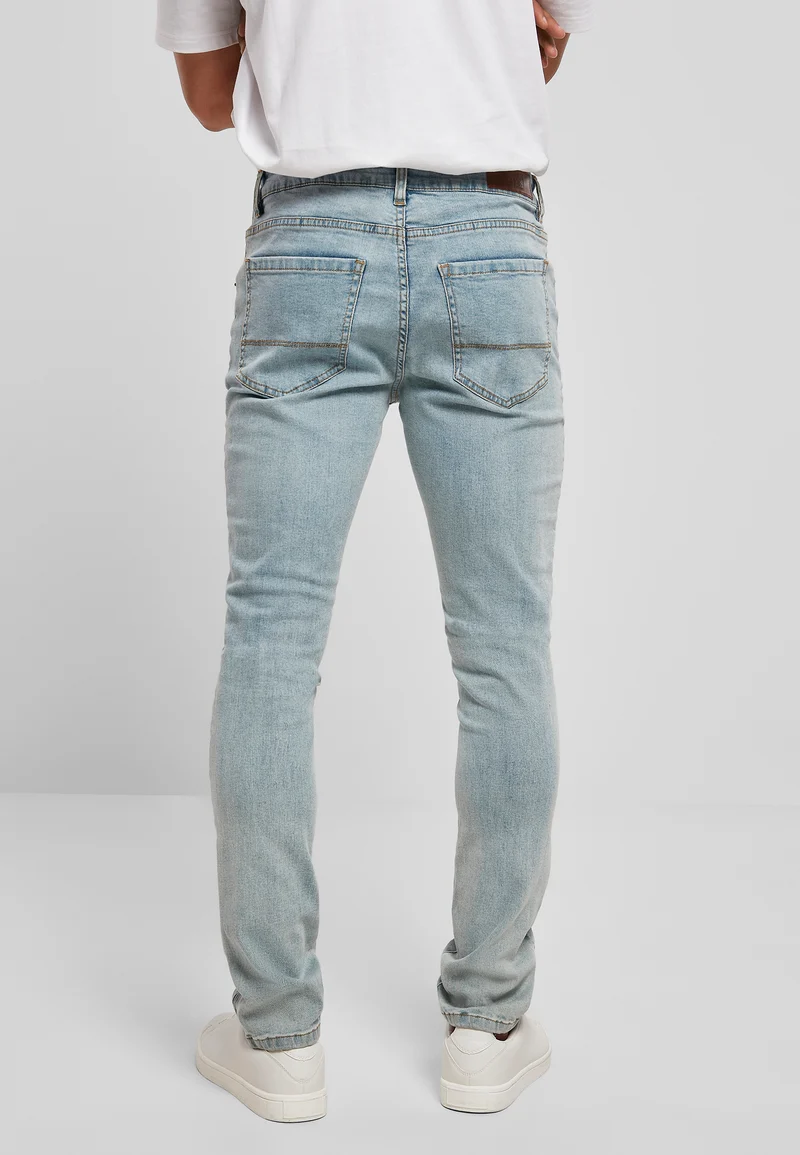 UC Slim Fit Zip Jeans