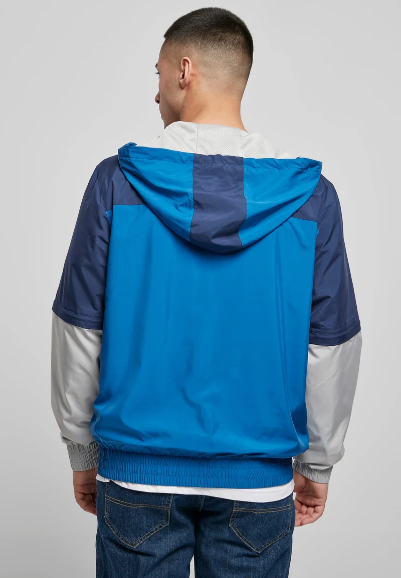 UC Zip Away Track Jacket