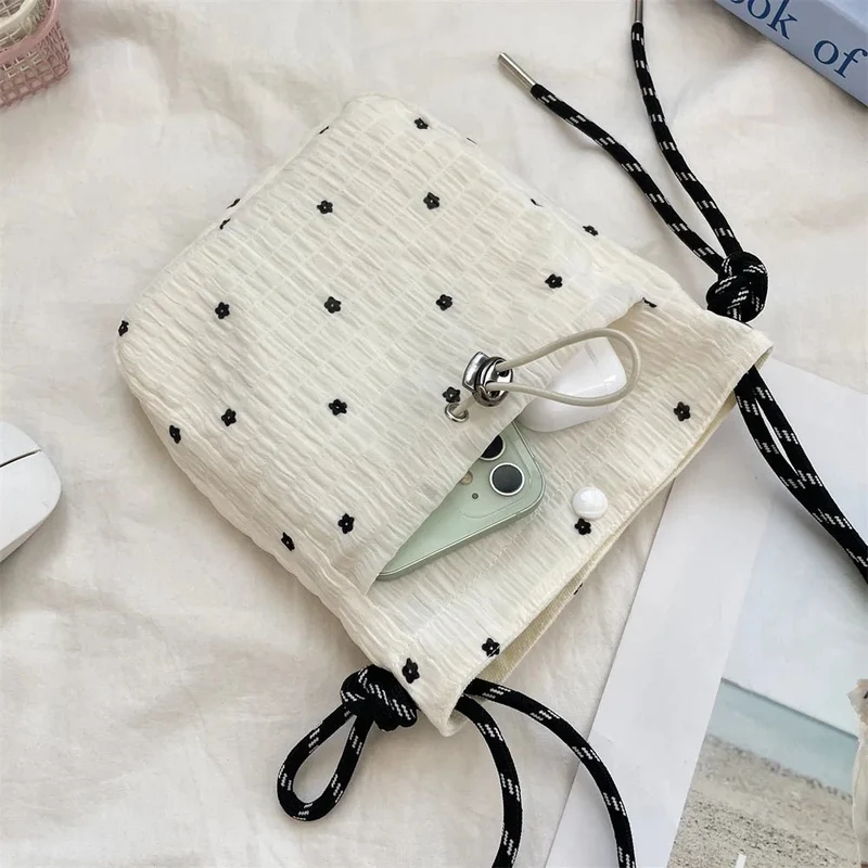 Stilvolle Damenhandtaschen: Die perfekte Mini-Umhängetasche mit Kordelzug