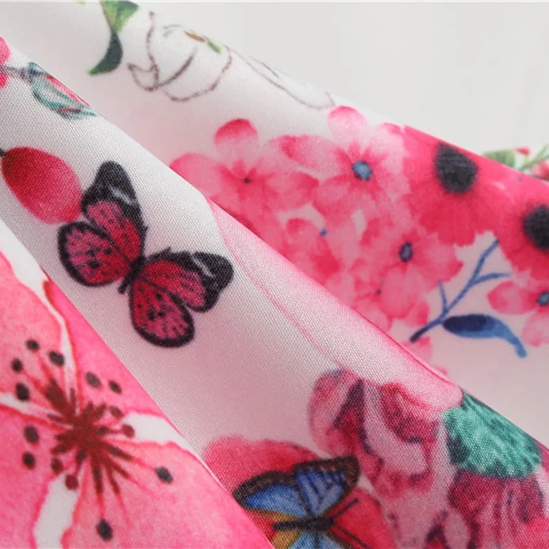 Vintage-Cocktailkleid mit Blumenmuster: Verleihen Sie Ihrem Stil zeitlose Eleganz.