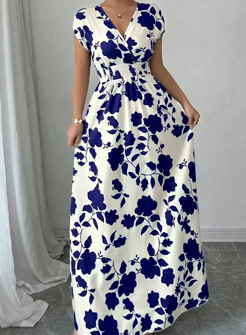 Verleihen Sie Ihrem Sommer-Look mit unserem Damen-Sommerkleid mit V-Ausschnitt das gewisse Etwas.