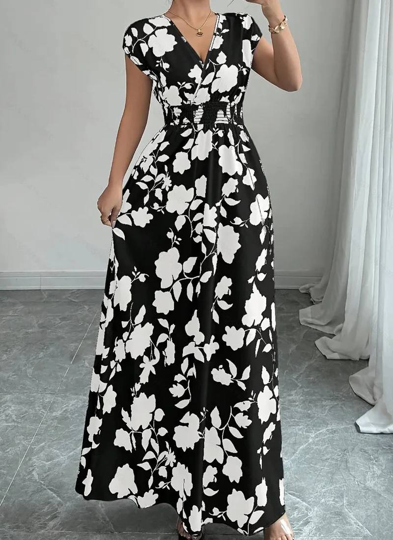Verleihen Sie Ihrem Sommer-Look mit unserem Damen-Sommerkleid mit V-Ausschnitt das gewisse Etwas.